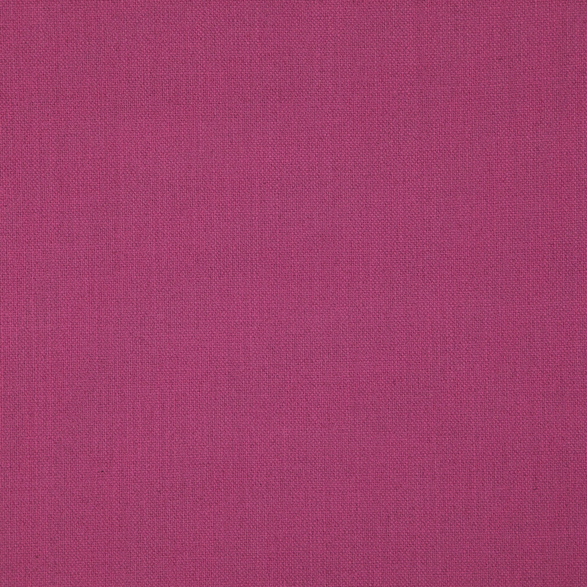 Magenta woven fabric close-up with textured weave.