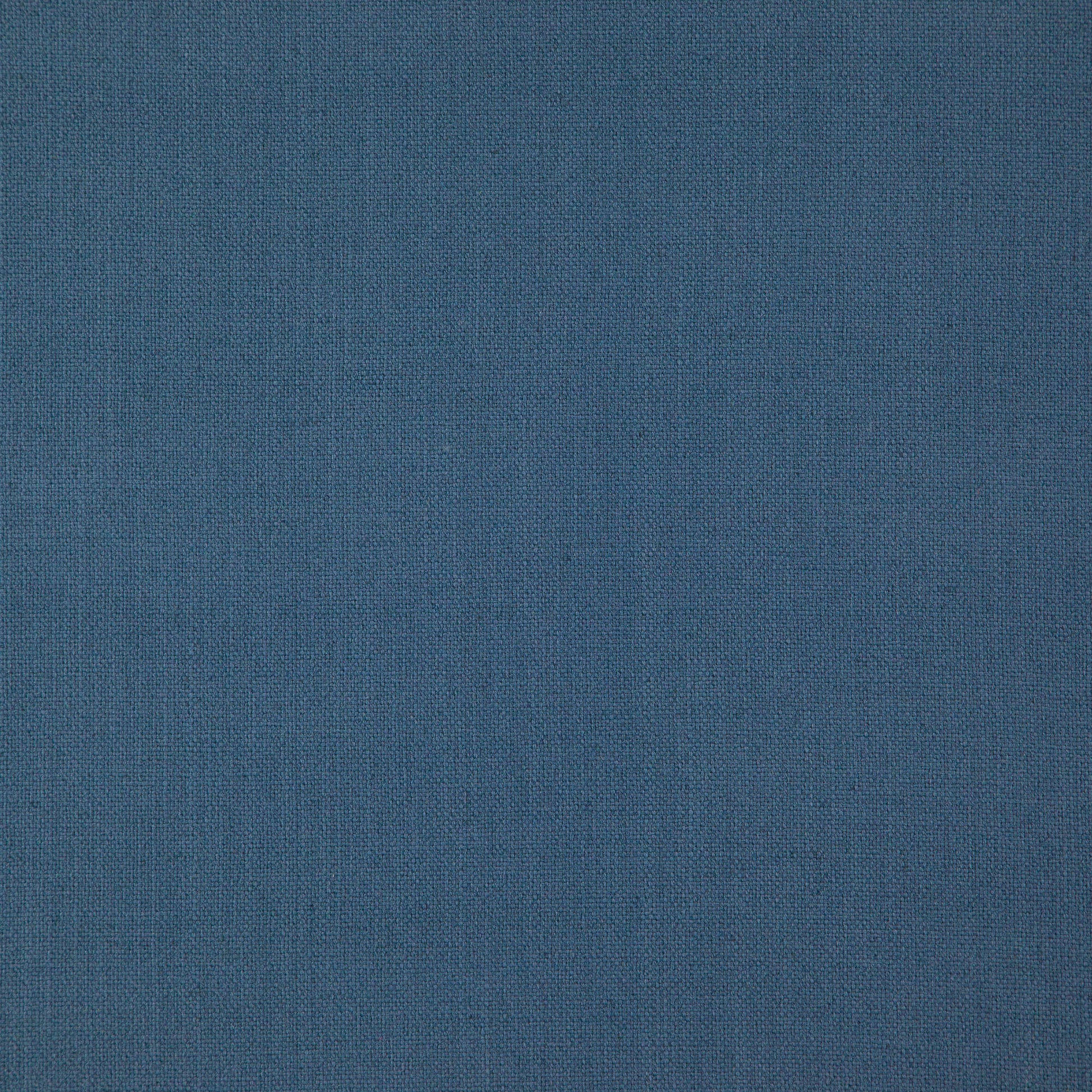 Blue woven fabric texture with tight weave, versatile upholstery or apparel material.