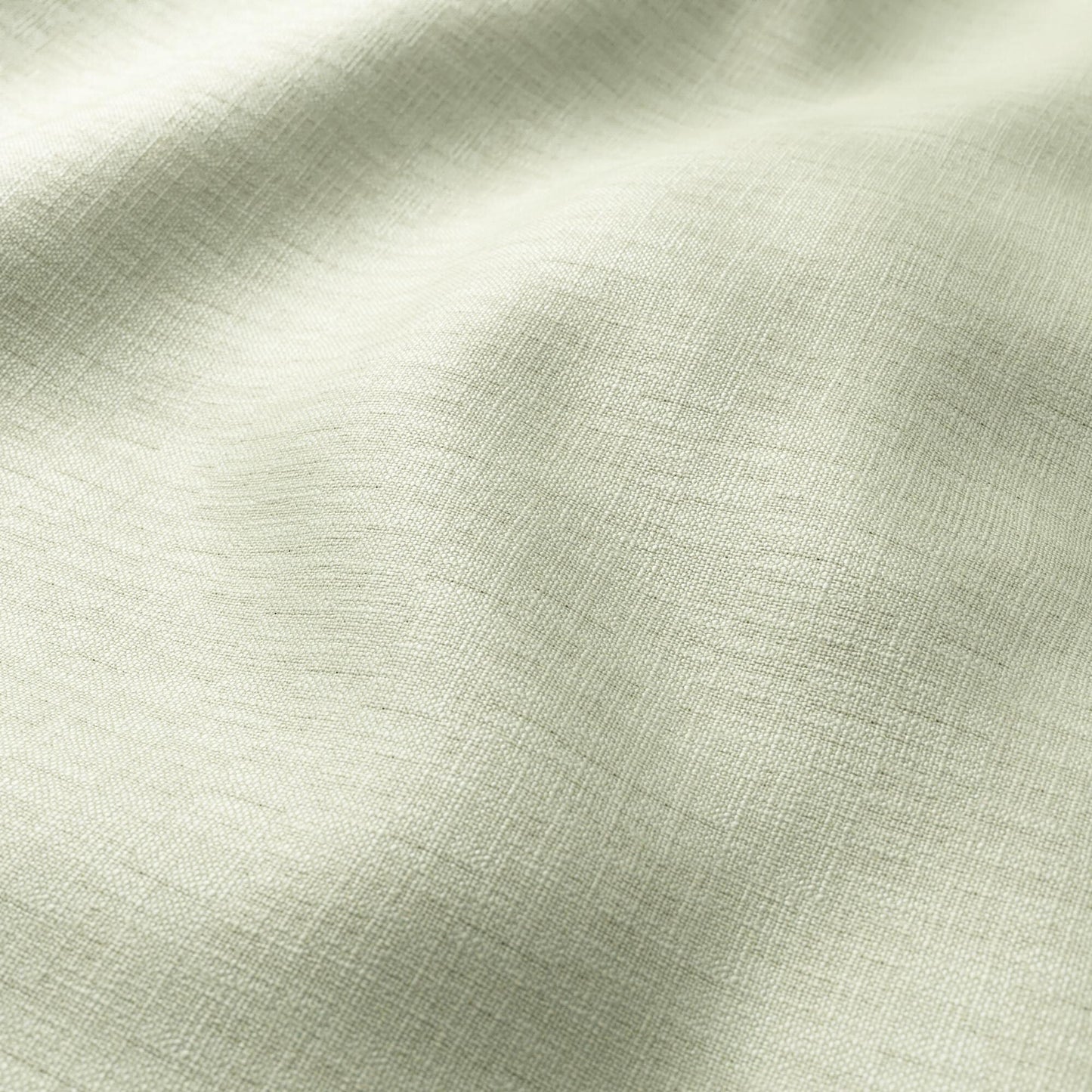 Green linen-like fabric close-up with subtle woven texture and soft folds; versatile for apparel or home textiles.