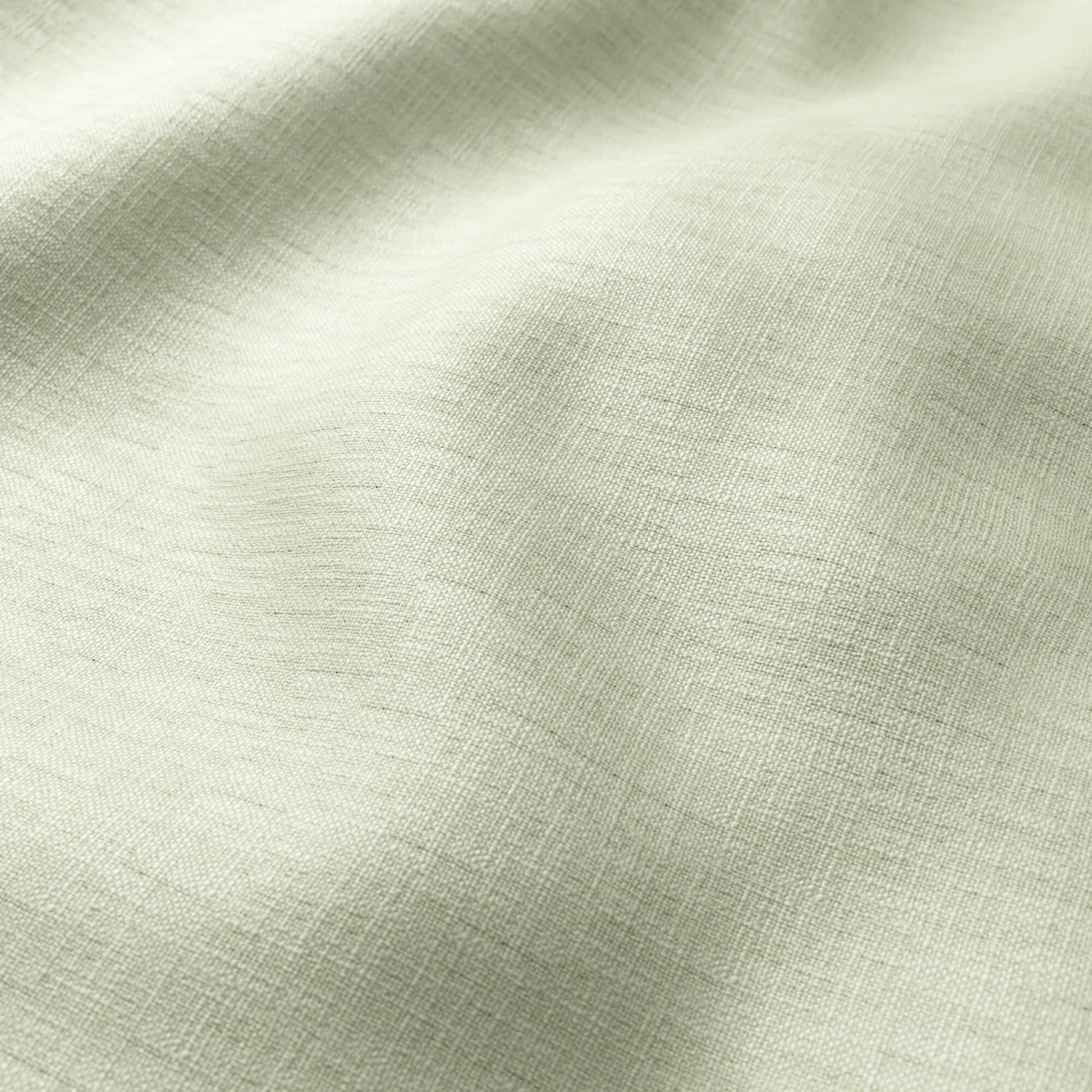 Green linen-like fabric close-up with subtle woven texture and soft folds; versatile for apparel or home textiles.