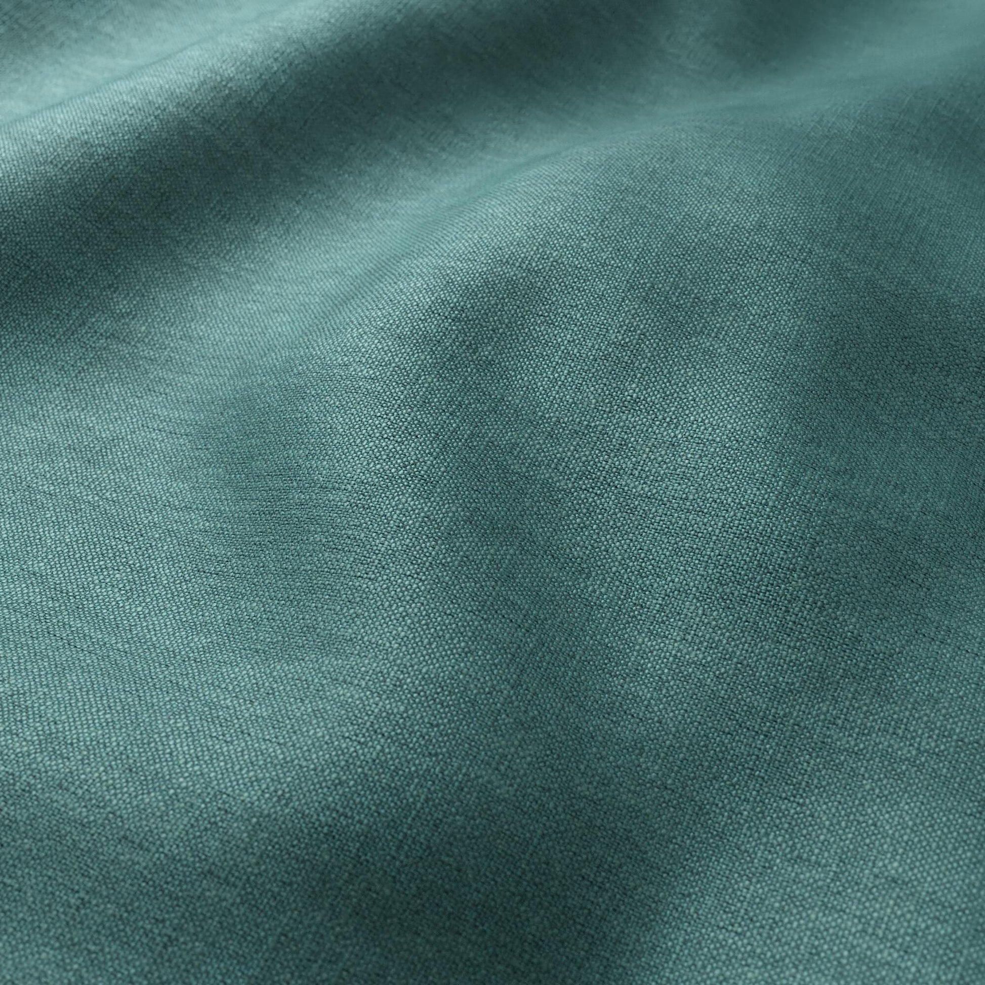 Teal linen blend fabric with soft drape and visible weave texture.