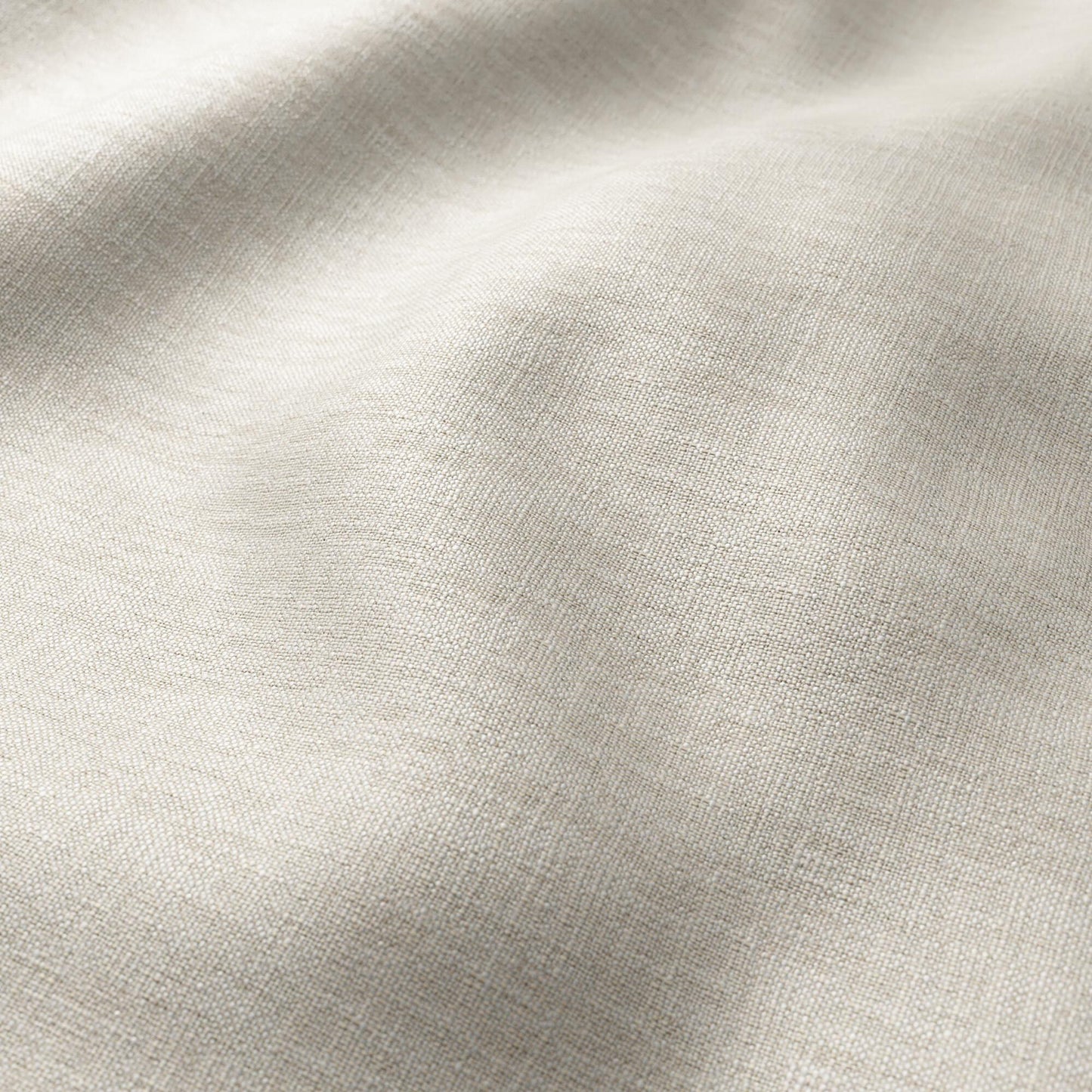 Grey woven fabric close-up with textured weave and soft drape.