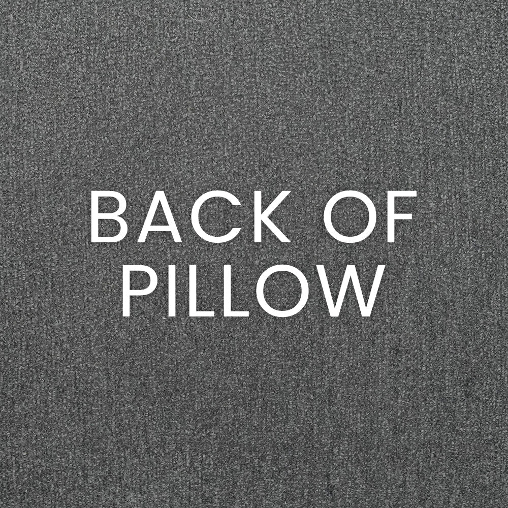 Back of pillow in dark grey textured fabric.