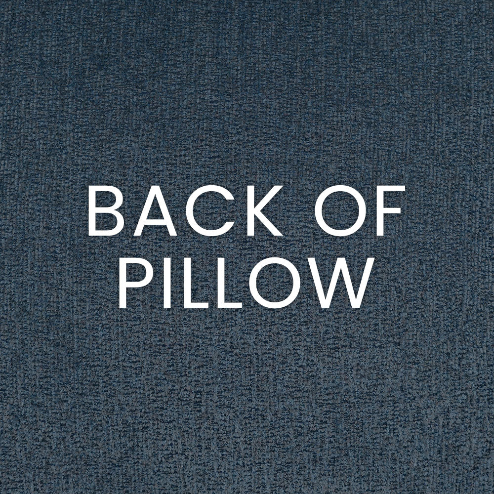Back of pillow in high-loft denim blue fabric with a textured weave.