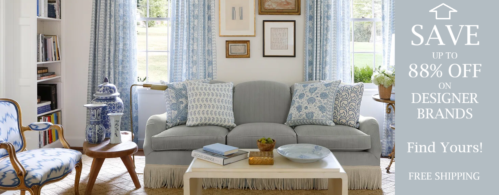 Living room with gray sofa, armchair, and coffee table with decorative items. Ad for Designer Brands sale on the right.