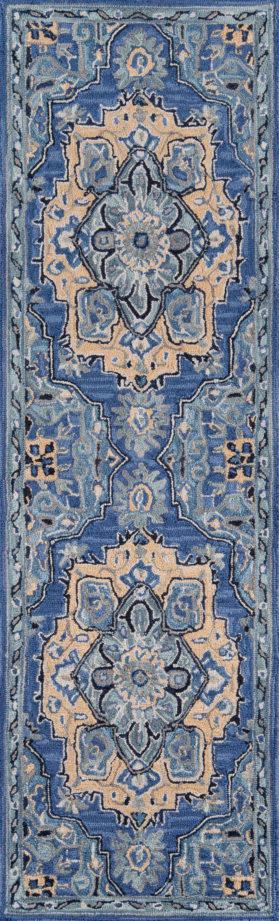 Blue oriental-style area rug with beige ivory medallions, teal borders and floral motifs.