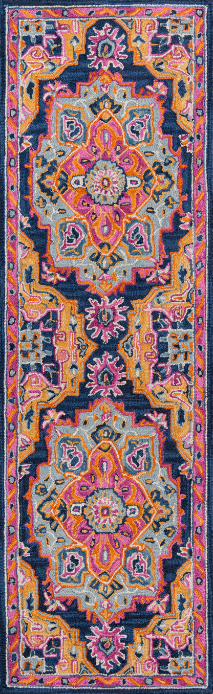 Vibrant Persian-inspired area rug with a navy base and hot pink, orange, teal and gold motifs, featuring ornate central medallions.