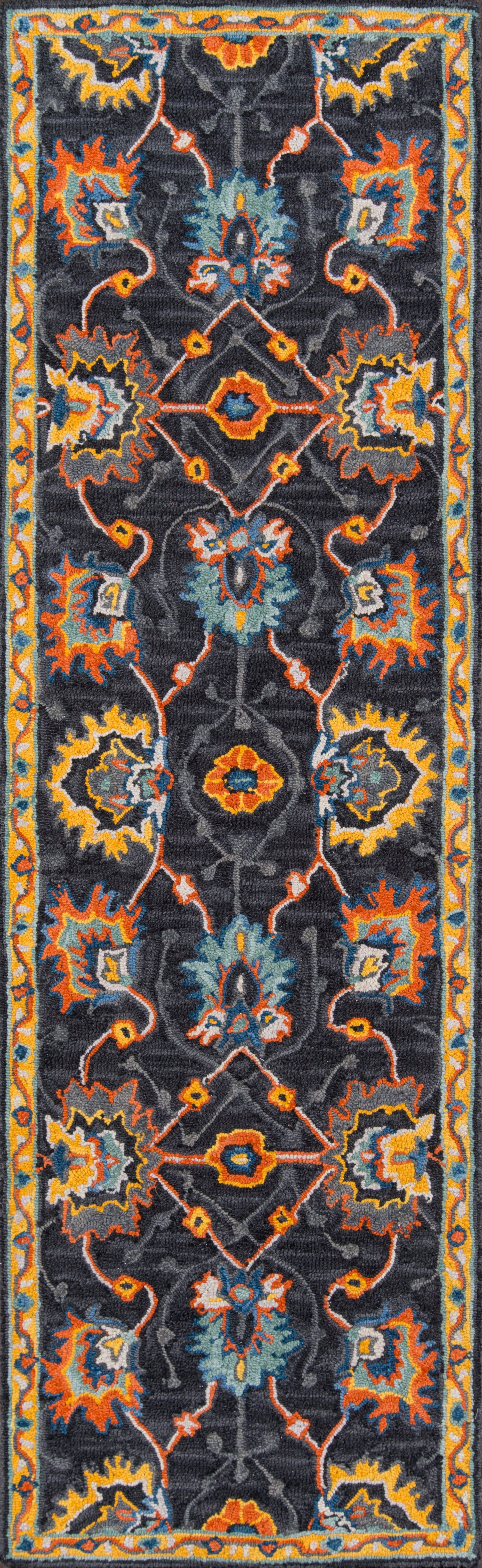 Navy rug, 2' x 3', featuring vibrant orange, teal and yellow floral medallions with a turquoise-yellow border.