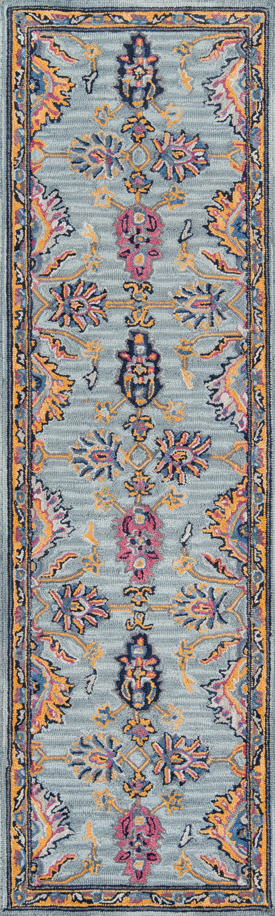 Blue oriental area rug with ornate floral medallions in yellow, pink and orange on a light blue field; dark blue border.