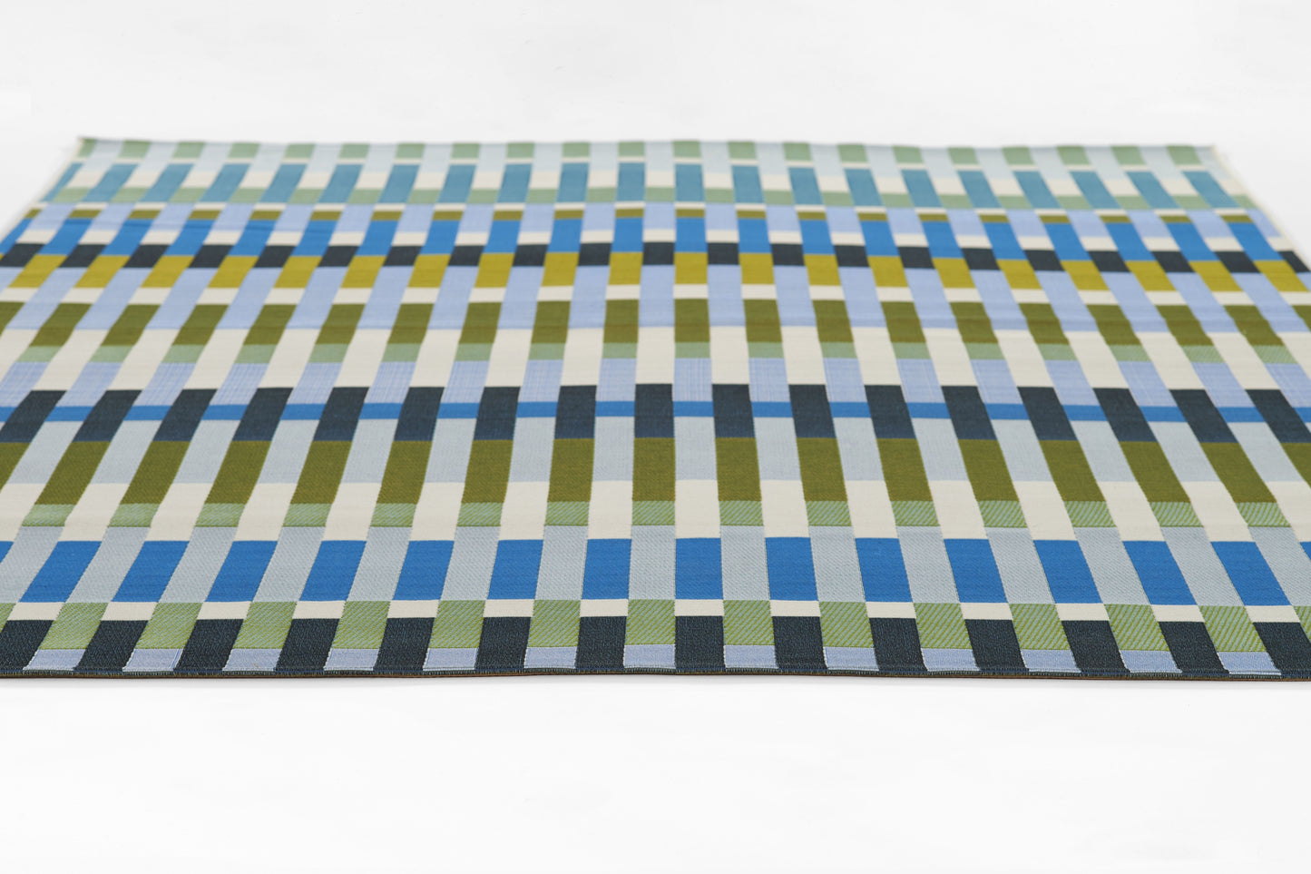 Rectangular woven rug with a modern geometric grid of blue, green and yellow stripes.