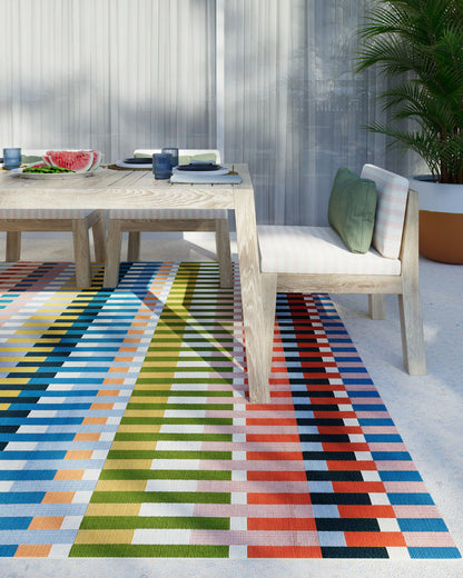 8’ x 10’ multicolor contemporary graphic Icon rug in vibrant modern pattern, durable indoor/outdoor polypropylene area rug, perfect for living room, patio, and statement home decor.