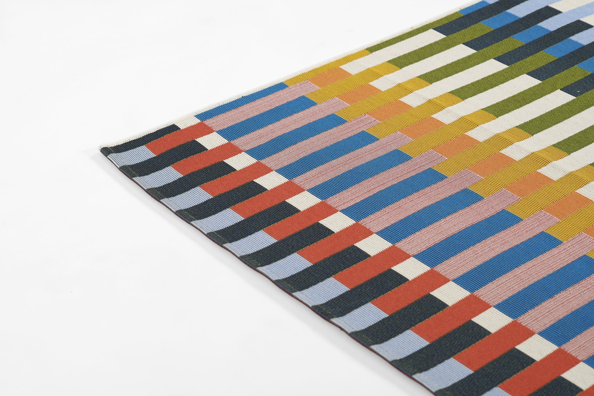 Woven geometric stripe rug, 2' x 3', with multicolor rectangular blocks in blue, orange, red, yellow and green.