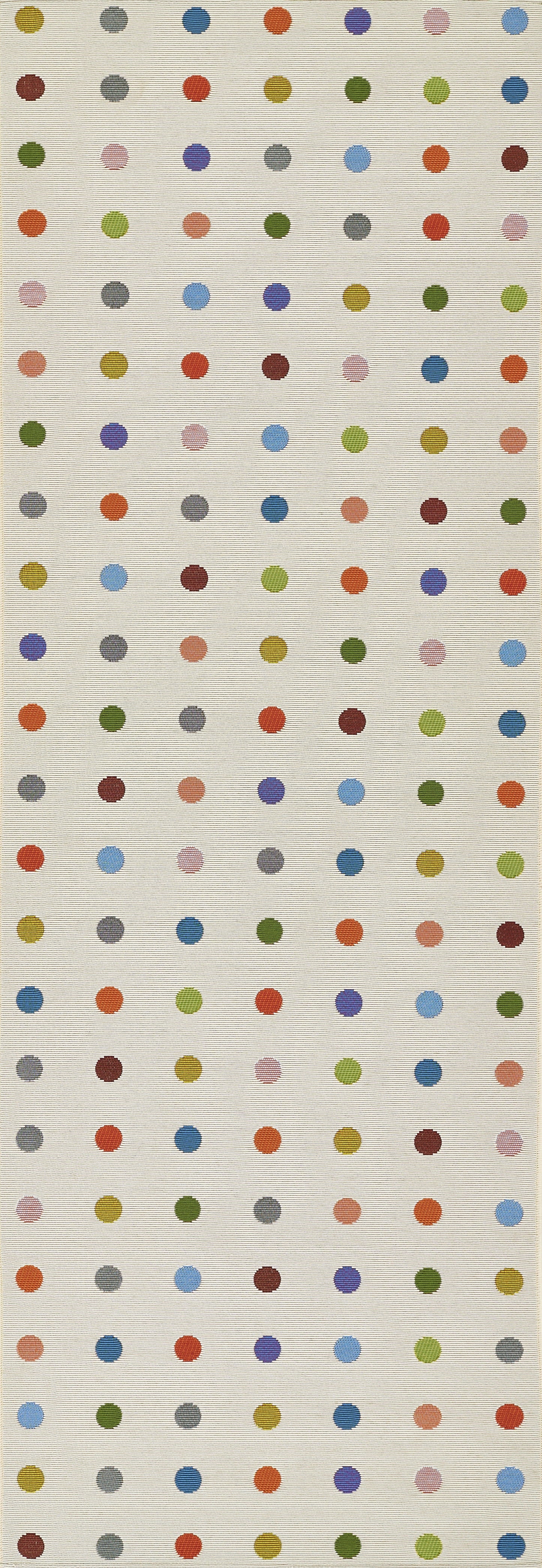 Tall beige woven rug featuring a grid of small multicolor polka dots; playful geometric pattern.