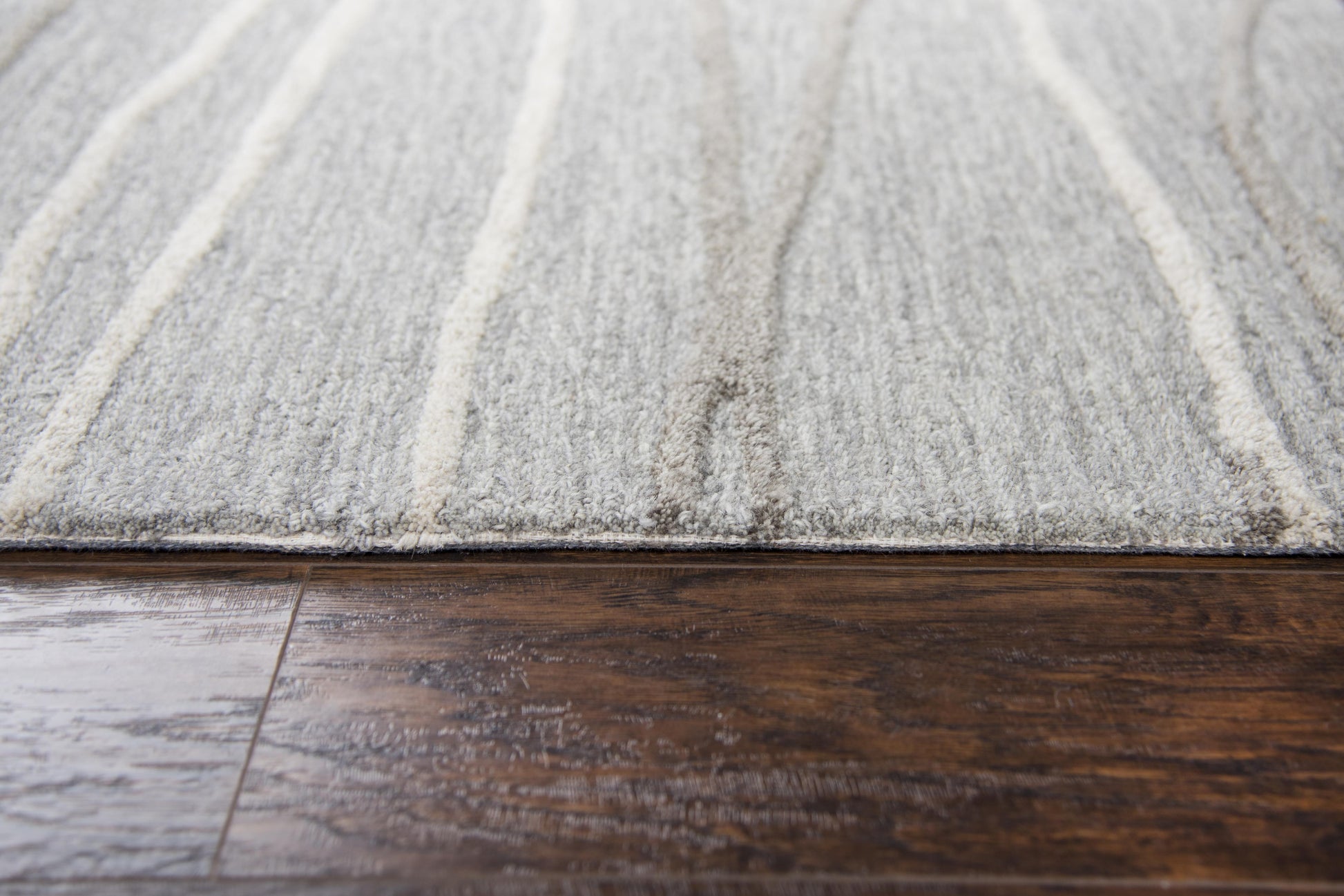 Rectangular rug with a contemporary design, 10' x 13'.