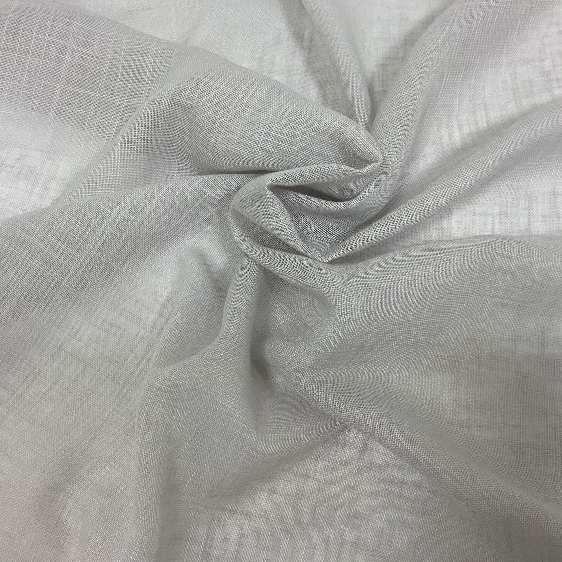 Light gray plain fabric with a subtle linen-like texture, softly twisted in the center.