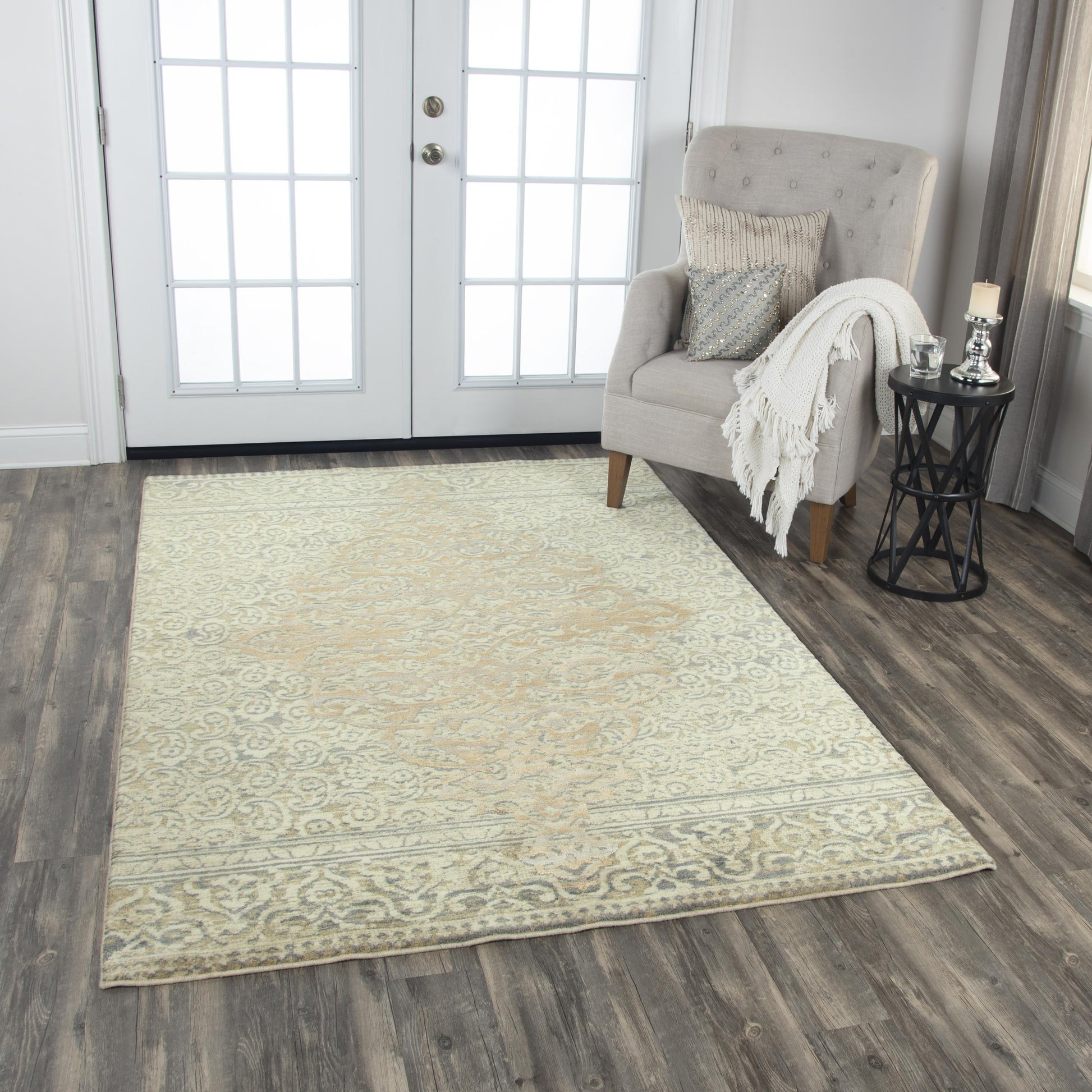 5' x 8' traditional rug with an intricate pattern.