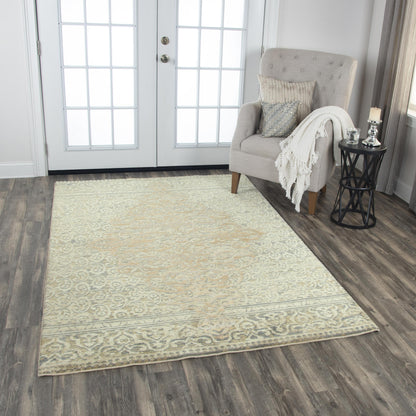 5' x 8' traditional rug with an intricate pattern.