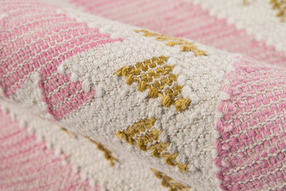 Pink, ivory and mustard geometric woven rug; textured loop pile, cotton-wool blend.