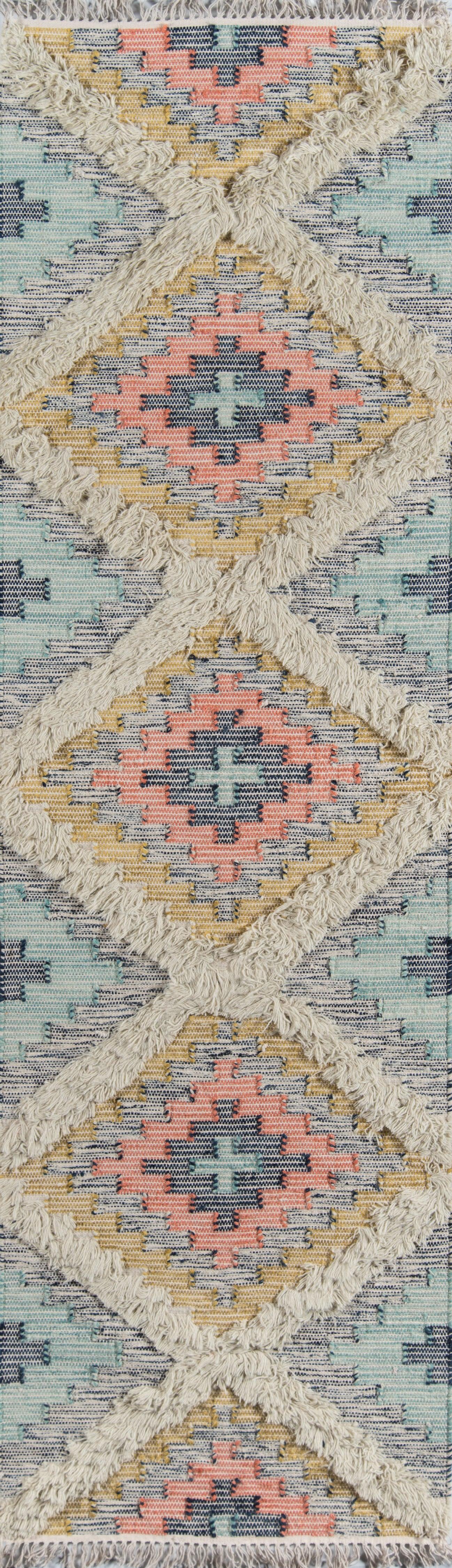 Colorful woven rug featuring interlocking diamonds in peach, blue, yellow and mint with fringed borders.