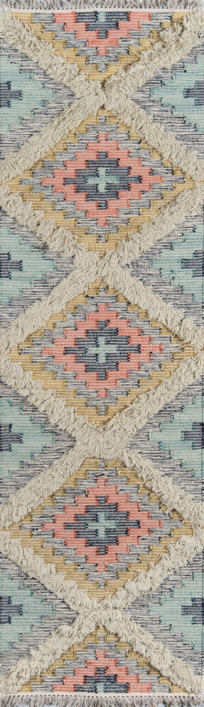 Fringe-trimmed kilim rug with pastel diamond motifs in coral, teal, yellow and navy.
