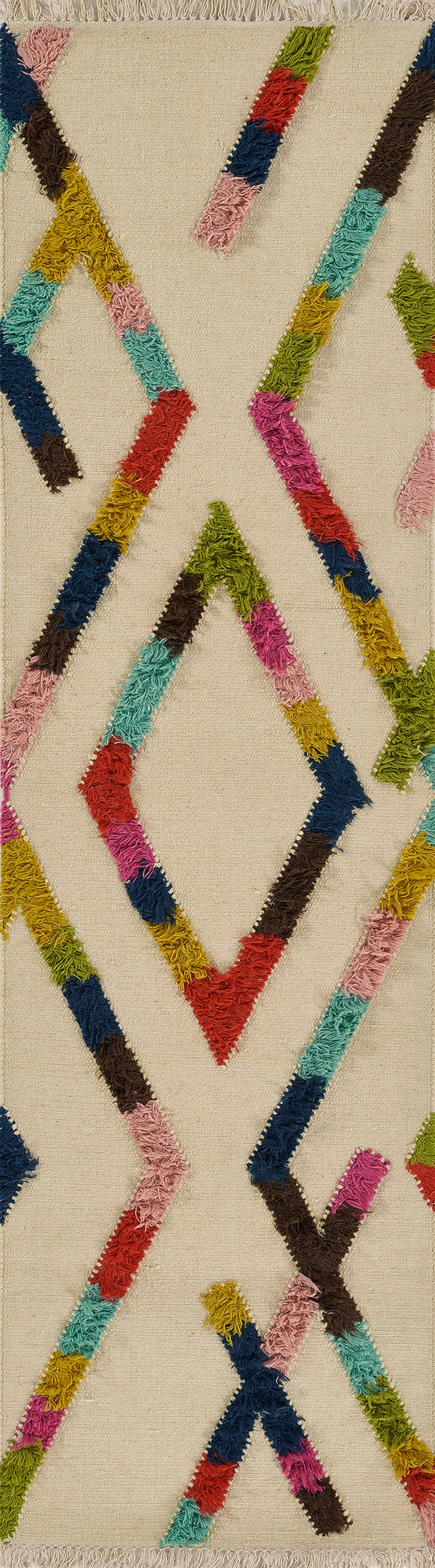 Beige woven rug with bold multicolor shaggy chevron stripes and X shapes in pink, teal, lime, red, blue, brown.