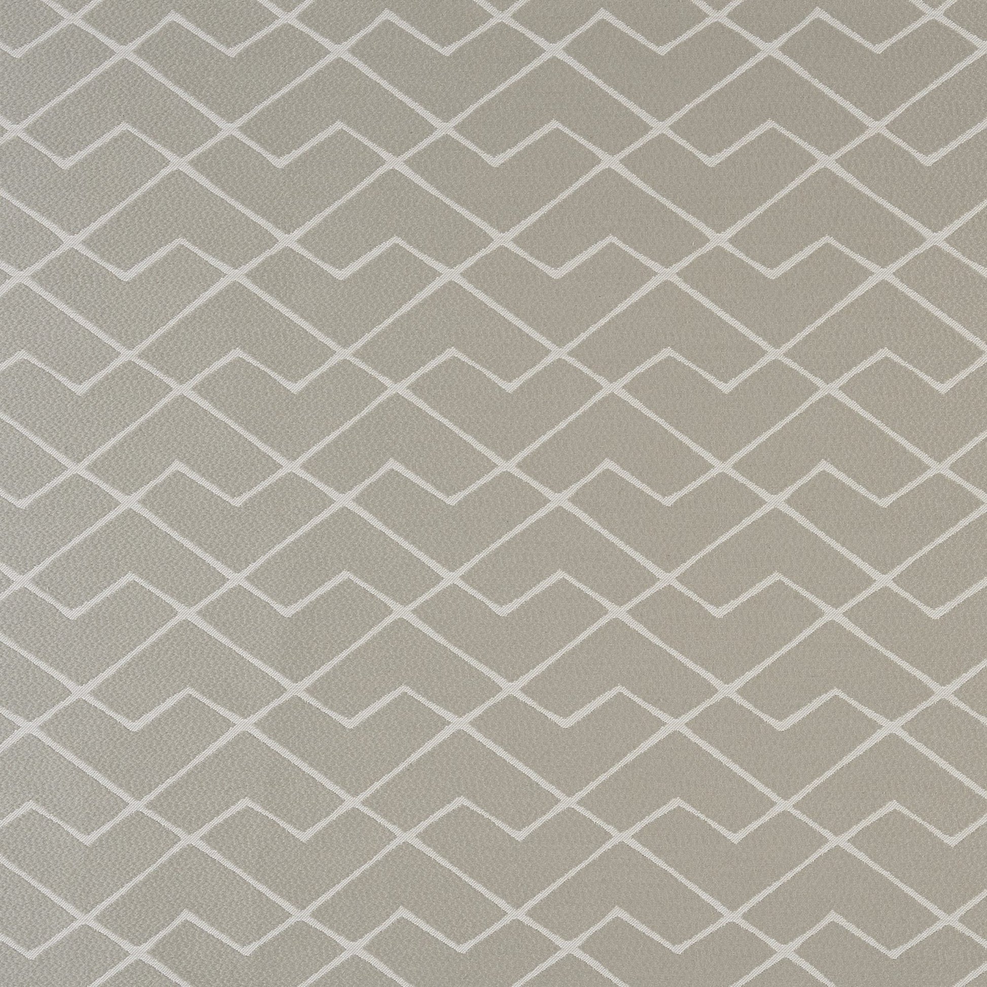 Grey fabric with a white geometric chevron lattice pattern and subtle woven texture.