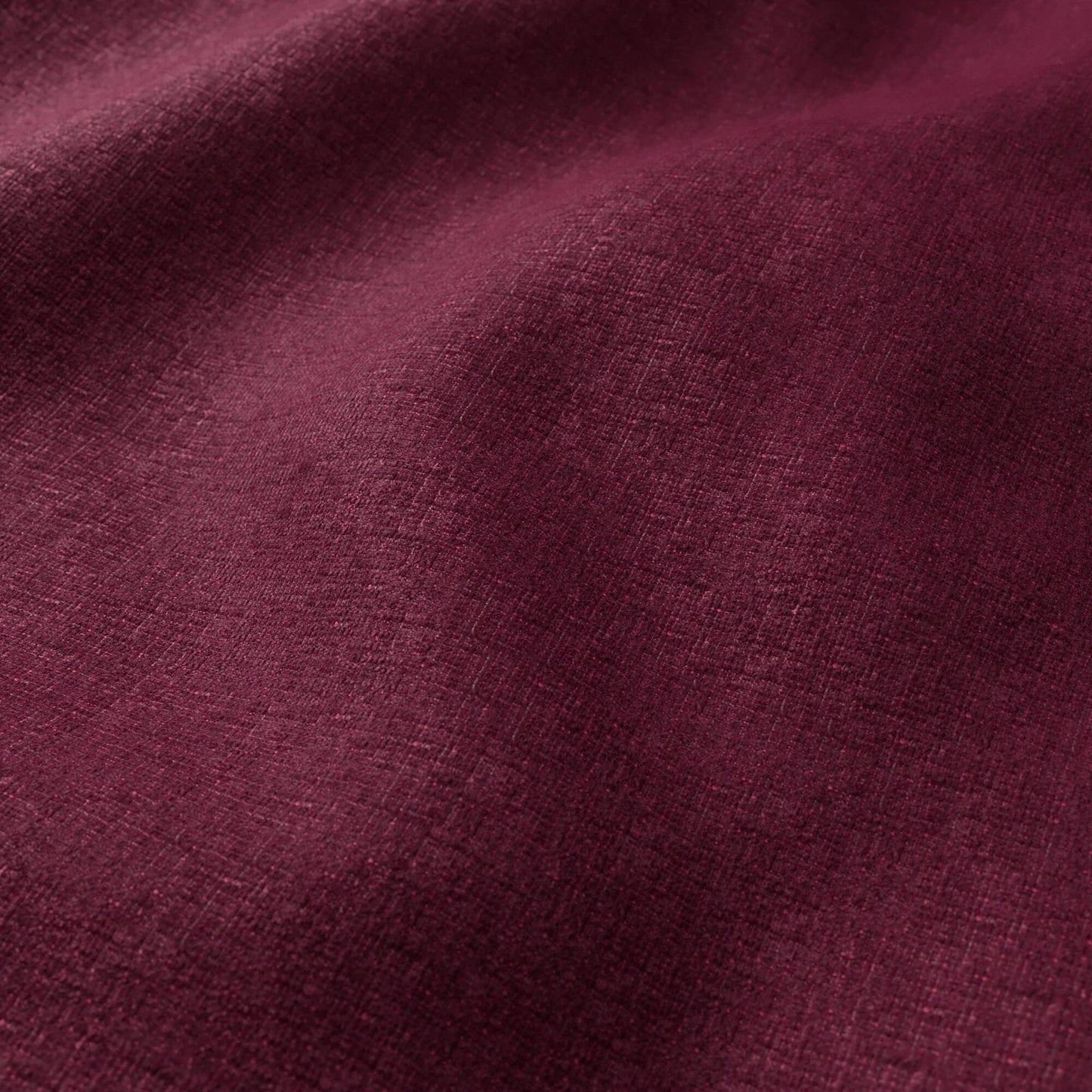 Close-up of mauve-purple chenille fabric with soft pile.