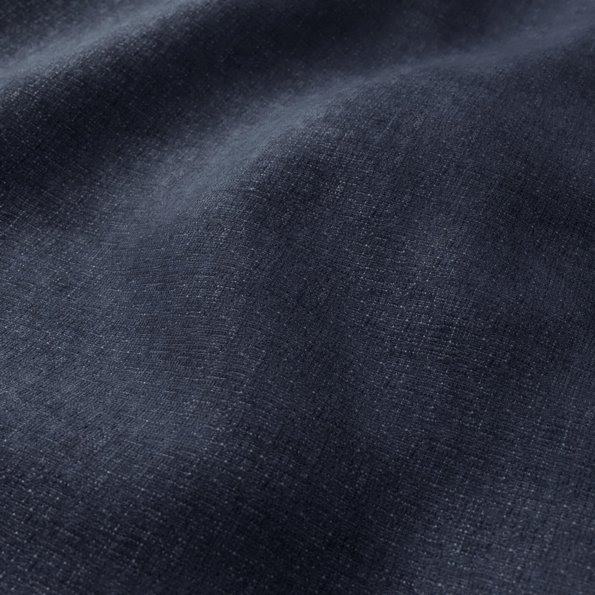 Dark navy chenille fabric close-up showing plush texture and soft folds.