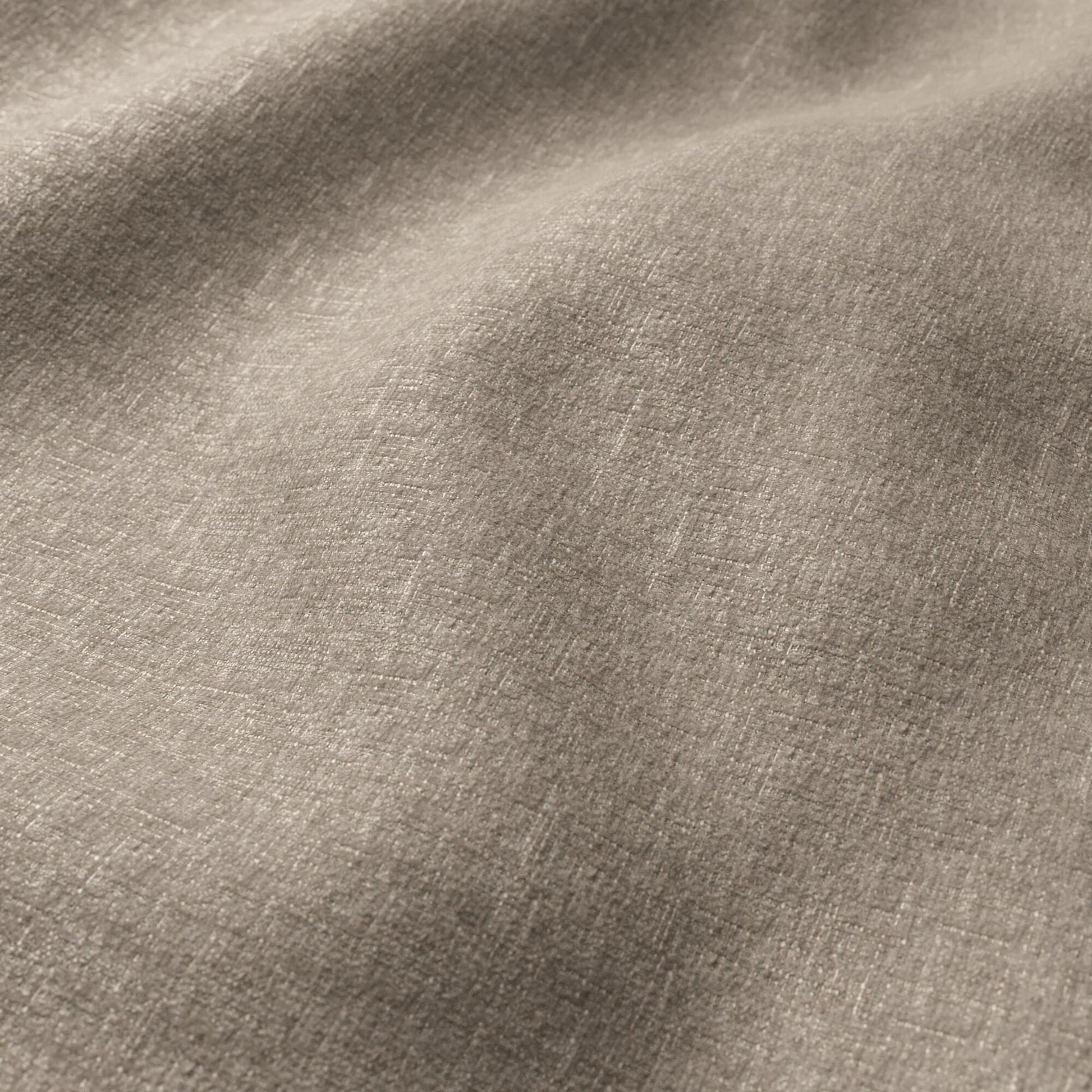 Gray-taupe chenille fabric close-up with soft folds and subtle weave; versatile for apparel or home decor.