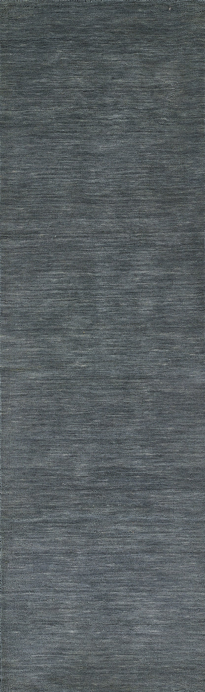 Blue-gray runner rug with heathered texture and subtle horizontal lines, flat-weave style, 2' x 8'.