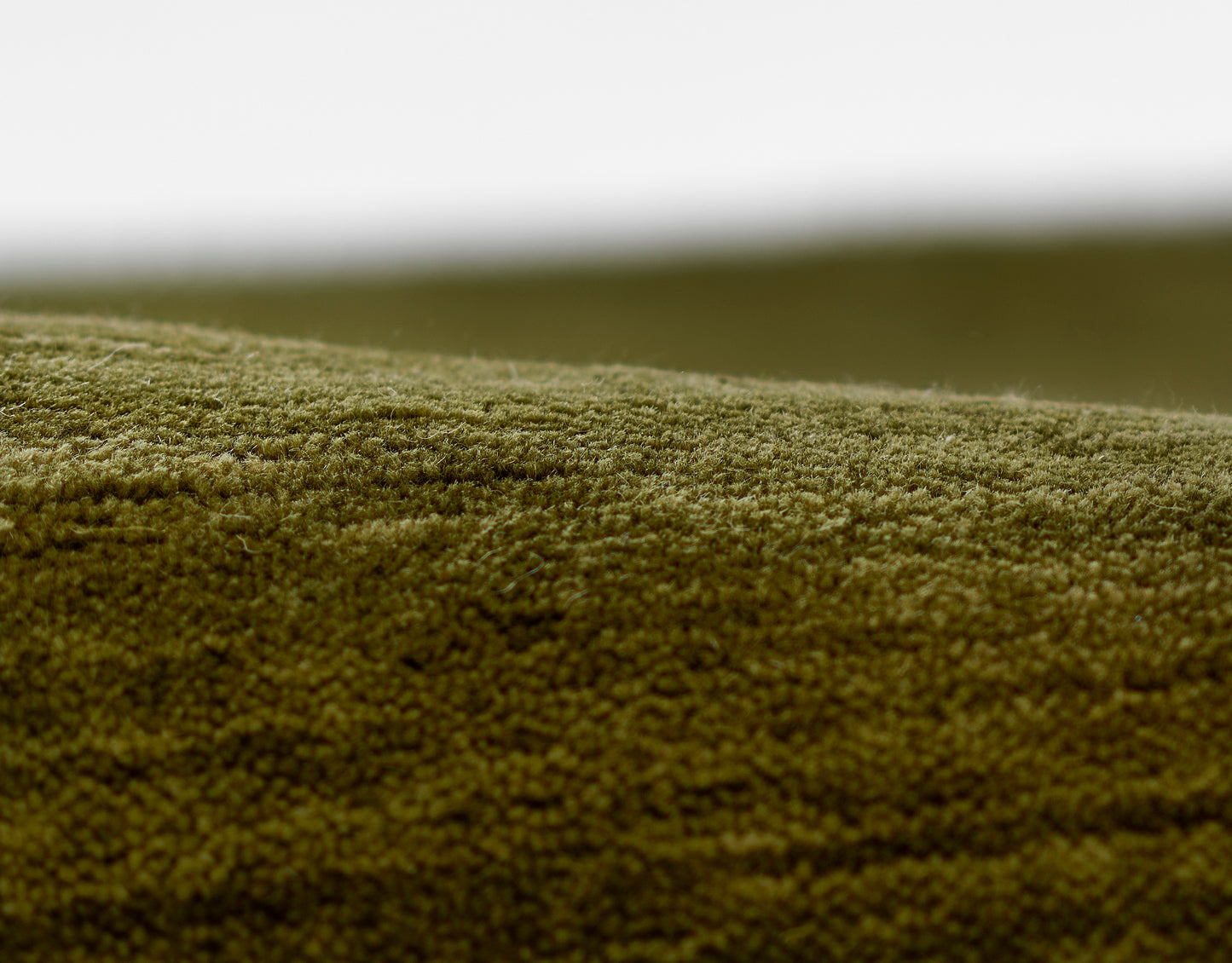 Olive-green rug runner, 2' x 8'.