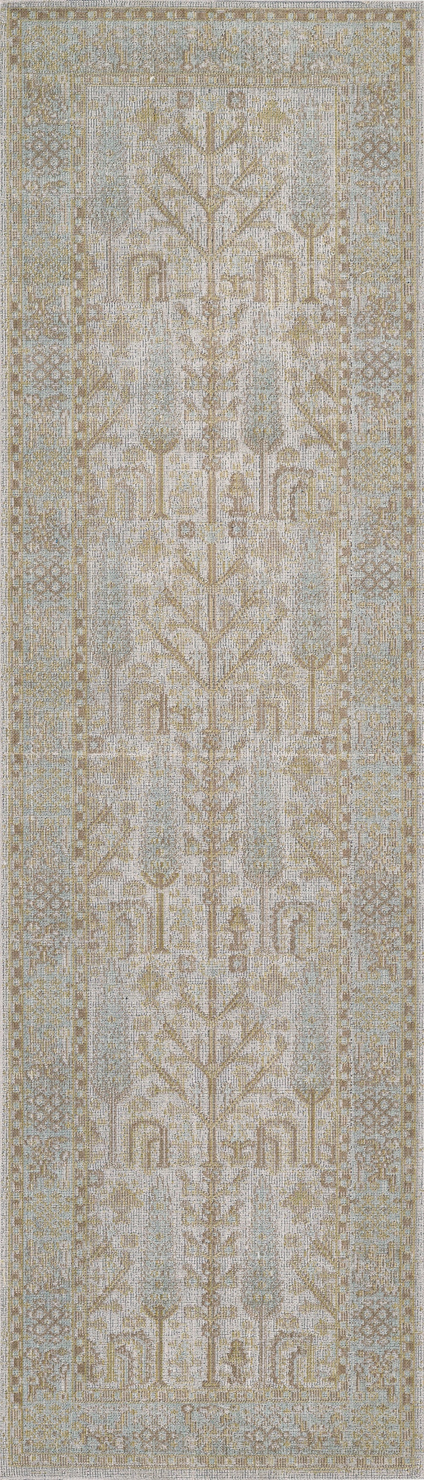 Isabella 4' x 6' rug in soft ivory, beige and pale blue with a distressed geometric-botanical pattern.
