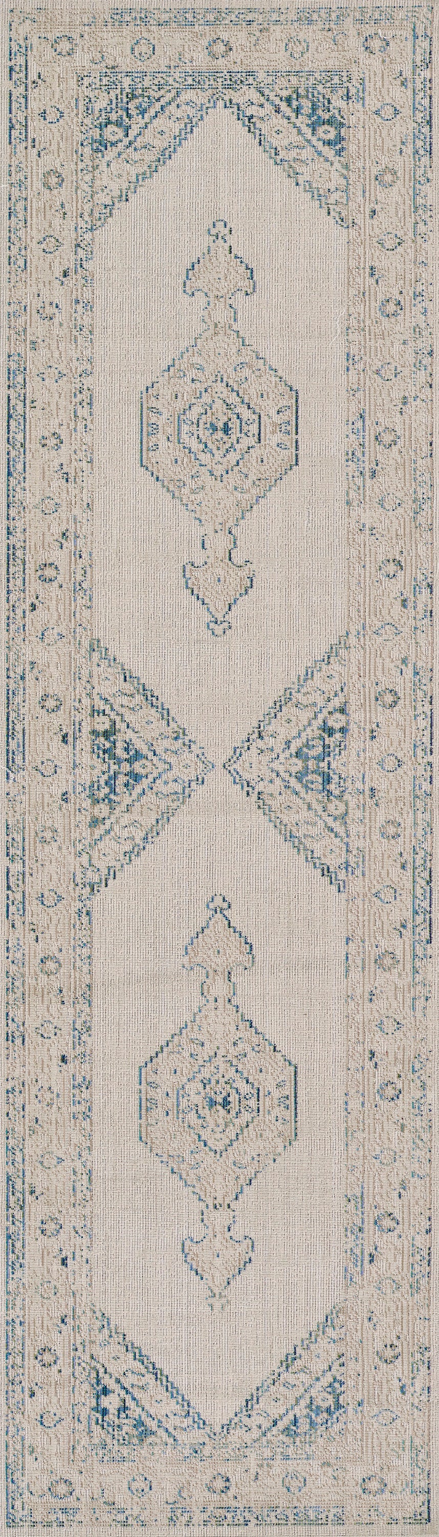 Blue and ivory area rug with geometric medallions and ornate border, indoor decorative rug.