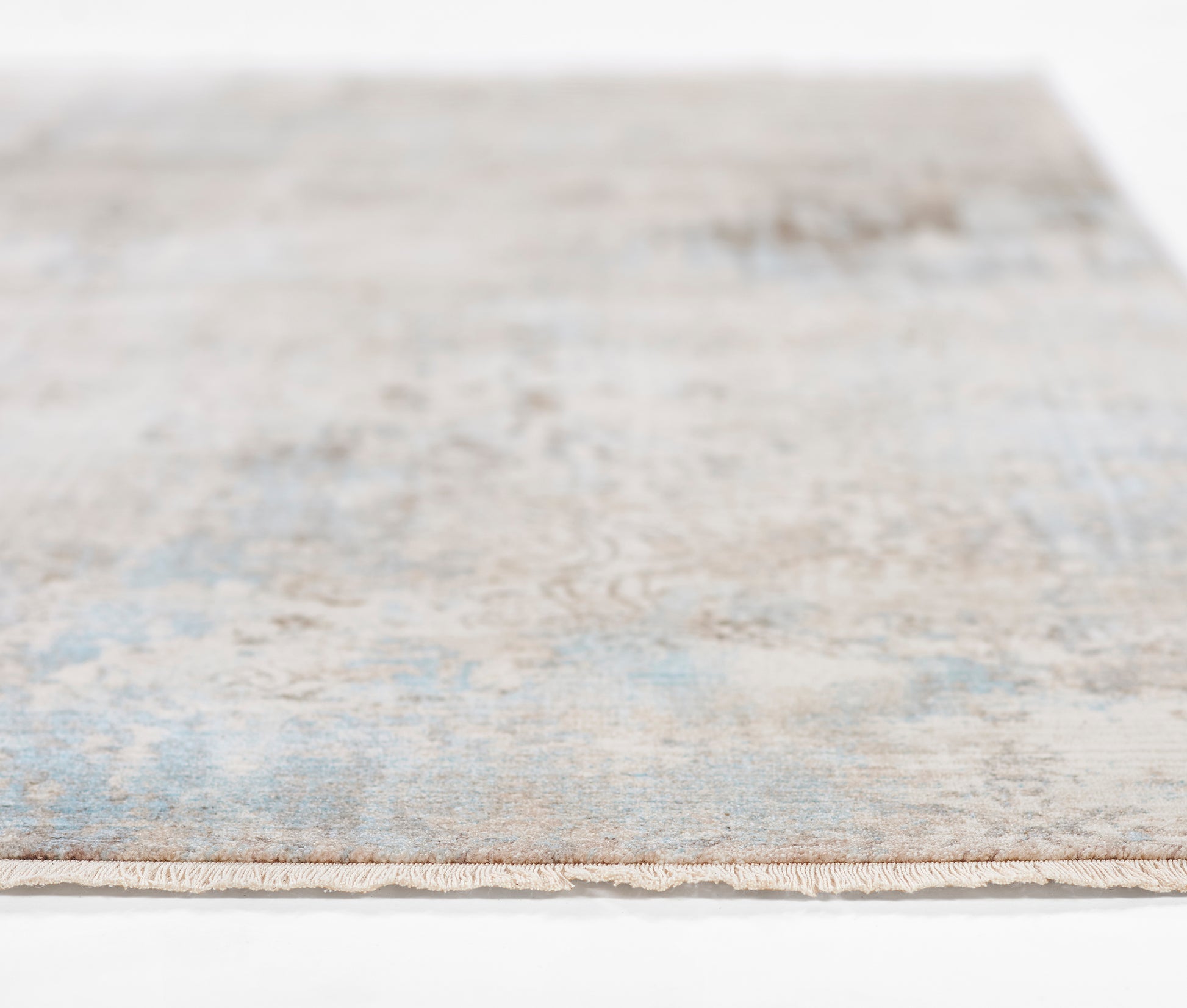 Blue and beige distressed rectangular area rug with a soft, low-pile texture; modern vintage style for living spaces.