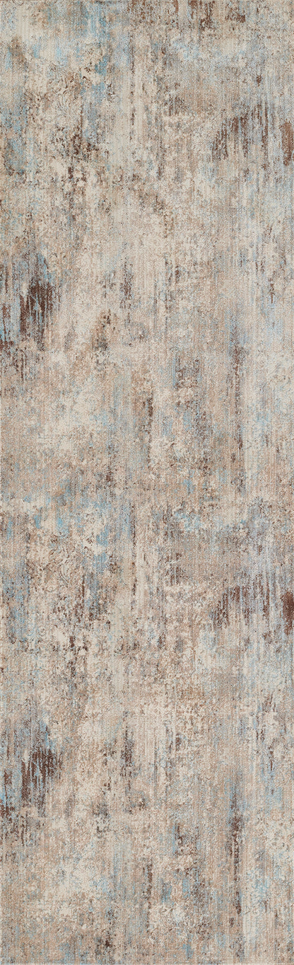 Distressed beige rug with blue & brown patches; vintage-inspired flat-weave look, versatile living room floor covering.
