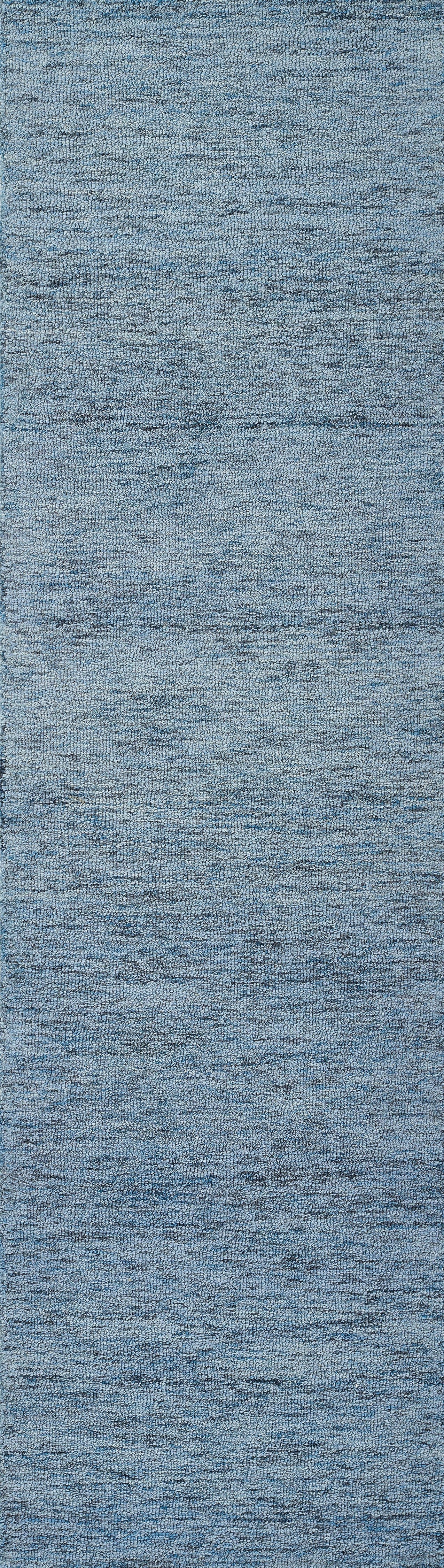Blue heathered woven fabric rug with denim tones; soft textured surface for modern living spaces.