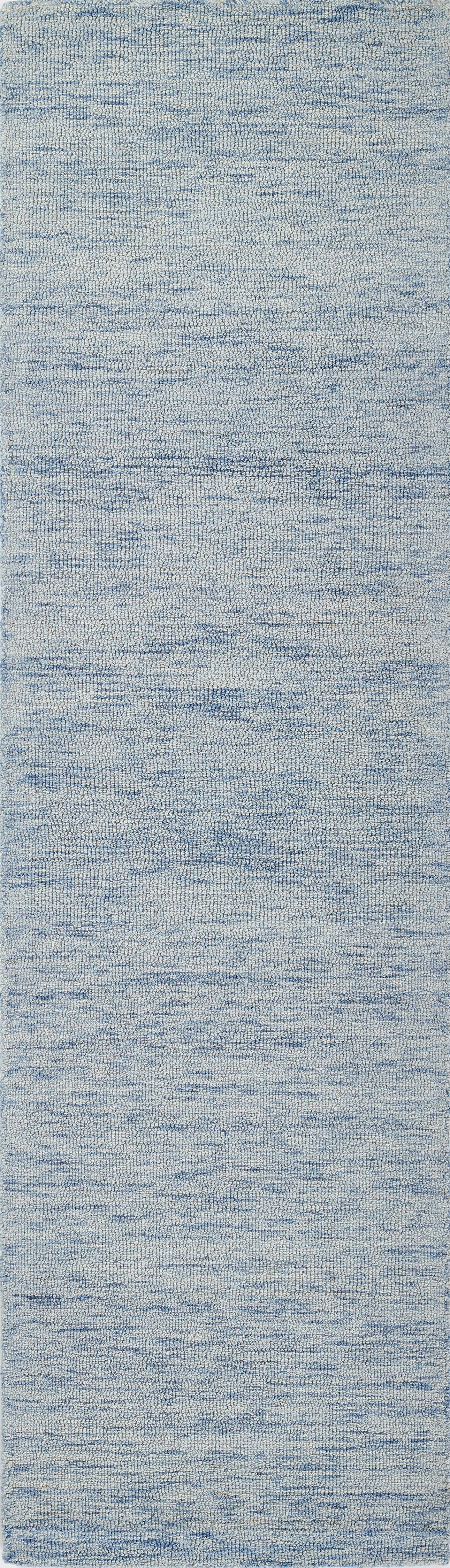 Light blue heathered rug with subtle white flecks; soft decor rug, 2' x 3'.