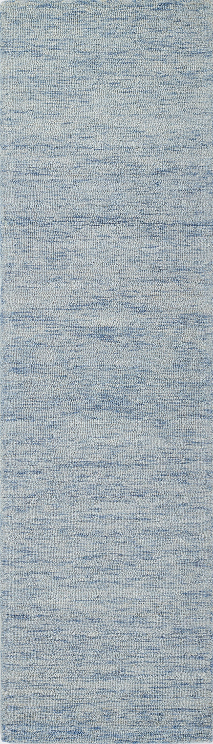 Light blue heathered rug with subtle white flecks; soft decor rug, 2' x 3'.