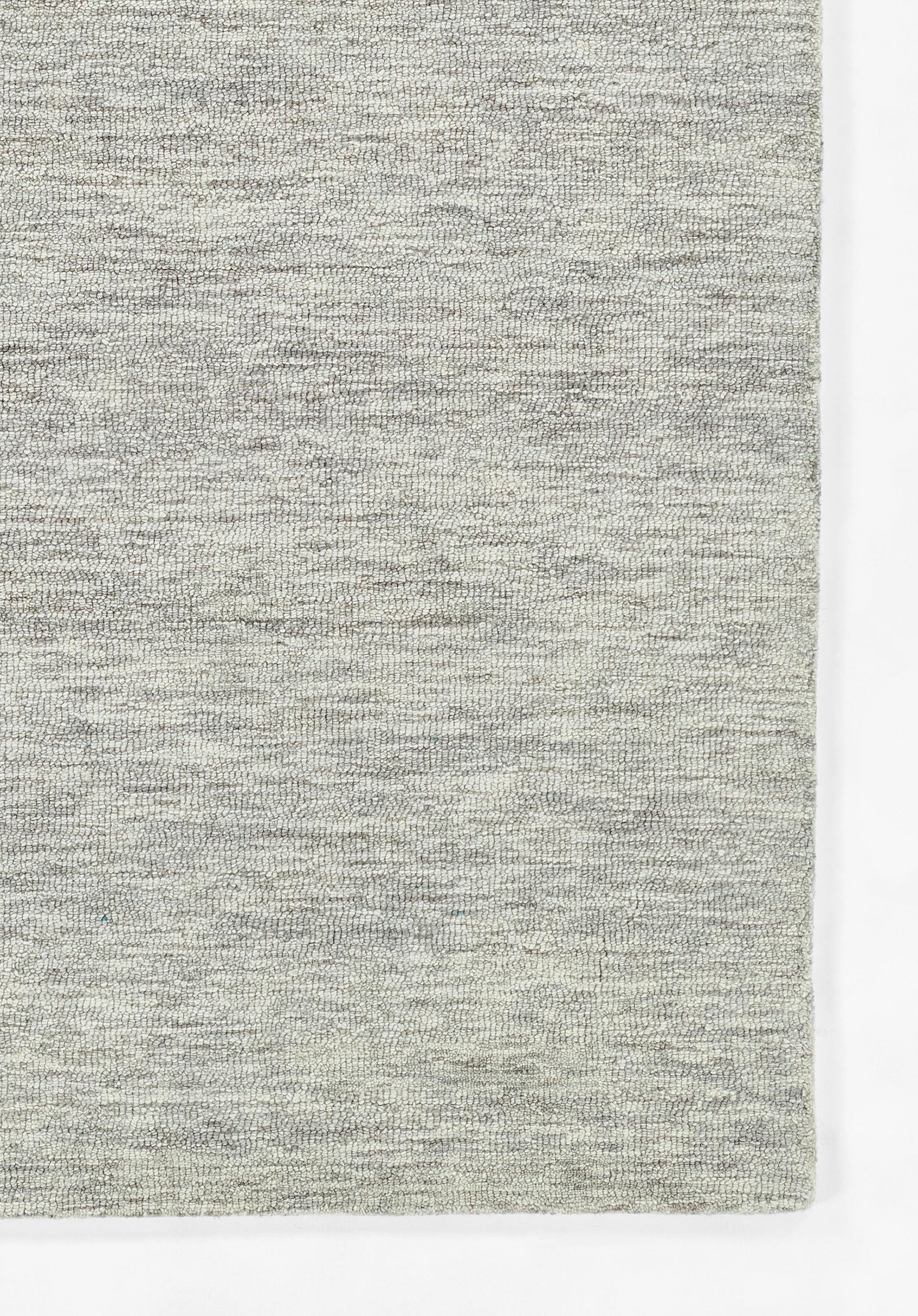 Gray heather rug close-up with subtle texture.