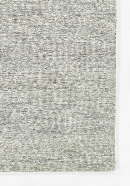 Light heather gray woven rug with subtle texture, rectangular 8' x 10' rug for living room or decor.