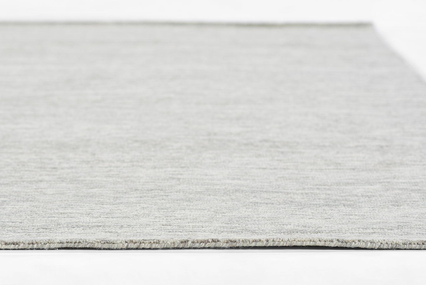 Pale gray flatwoven rug with soft texture, modern minimalist rectangular rug, 3'6" x 5'6