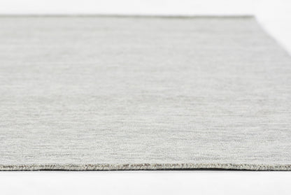 Light gray flat-weave runner rug with subtle texture and clean bound edge.