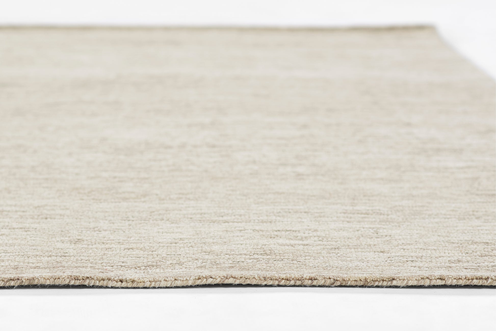 8' x 10' natural beige flat-weave jute rug, rectangular with a textured surface, casual coastal style.