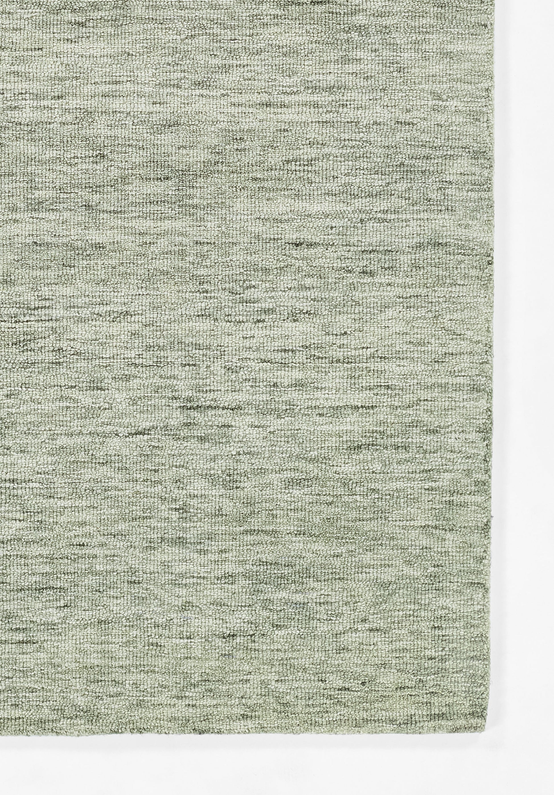 Sage green heathered woven textile swatch with soft texture, rectangular rug-like fabric for home decor.