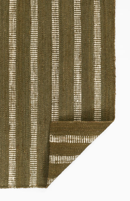 9' x 12' olive green woven rug with white vertical stripes and a folded corner showing a matching striped border; cotton rug.