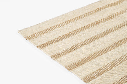Natural woven jute rug with beige base and tan striped bands; textured, casual floor accent.