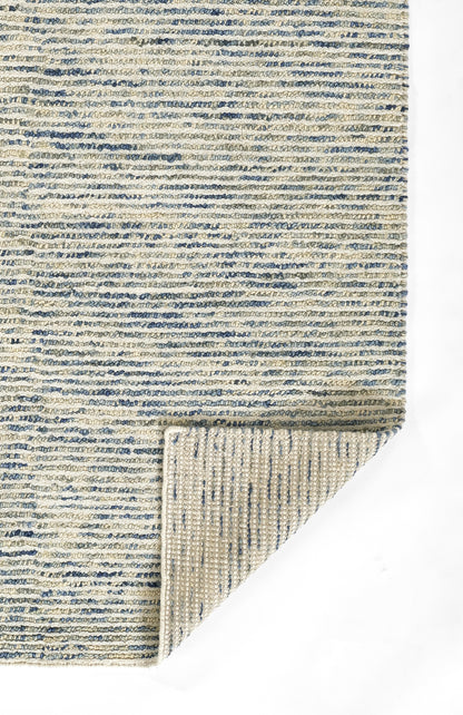 Beige woven rug with blue horizontal stripes; textured short pile, folded corner showing the back.