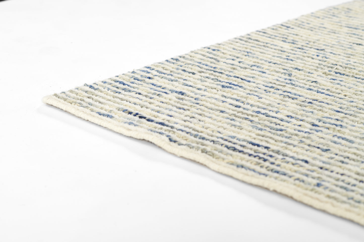 Cream flatweave runner rug with blue striped pattern and woven texture, corner edge visible.