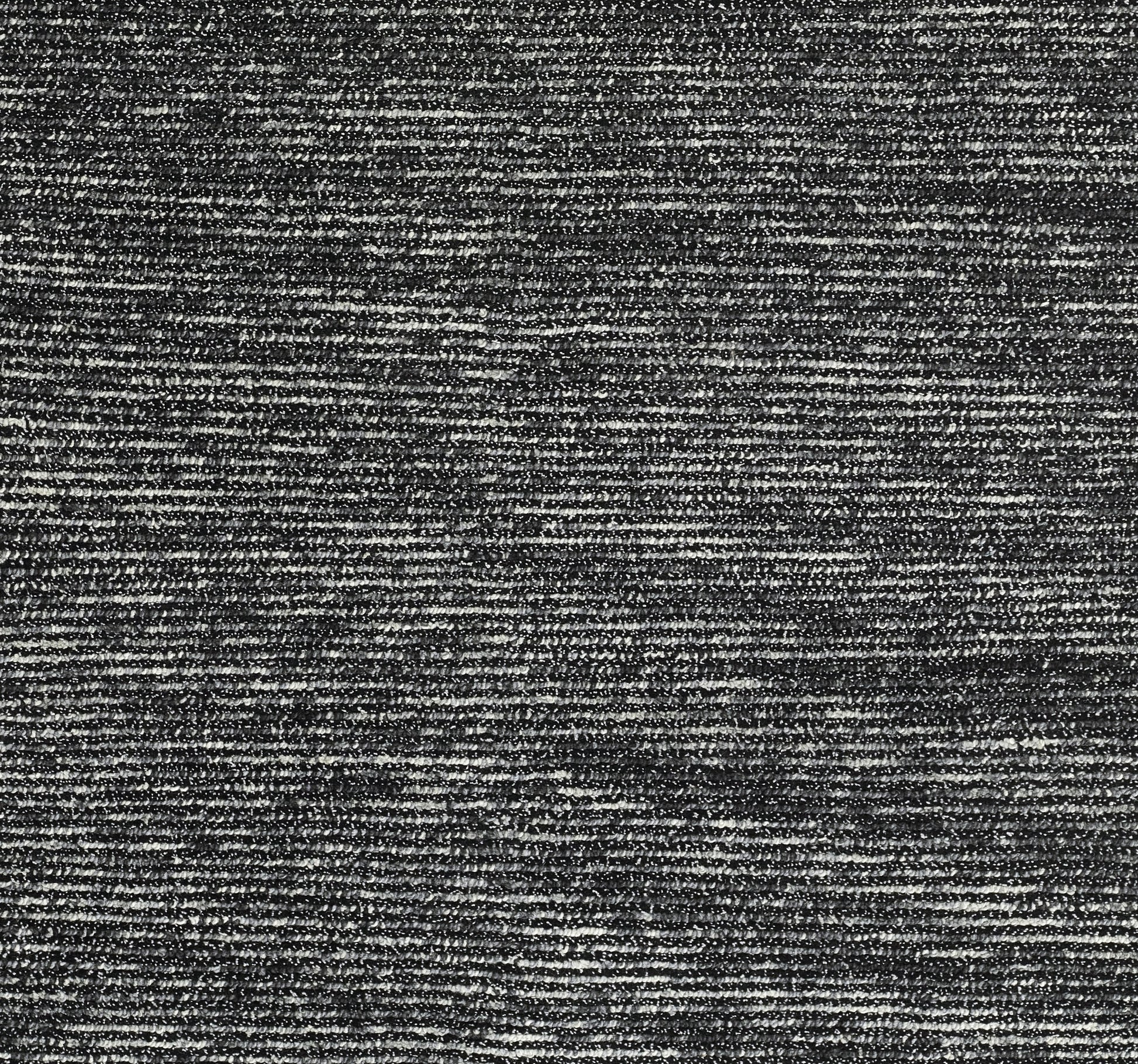 Close-up of dark charcoal heather rug with fine horizontal weave and subtle texture.