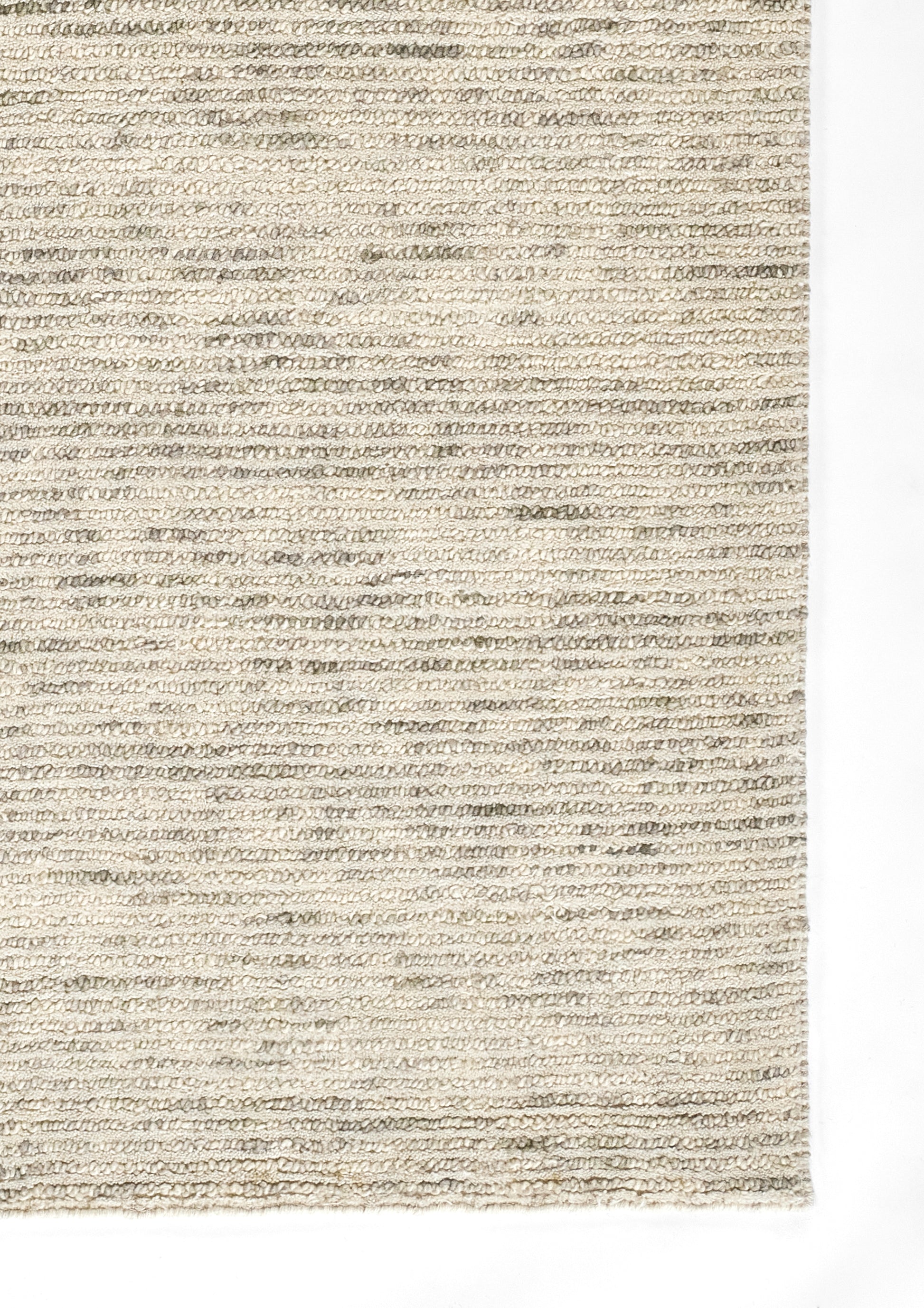 Beige woven rug with cream-taupe looped texture and subtle horizontal stripes, rectangular.